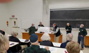 Class Meeting Johansen presenting check for 60th Reunion Alumni Fund